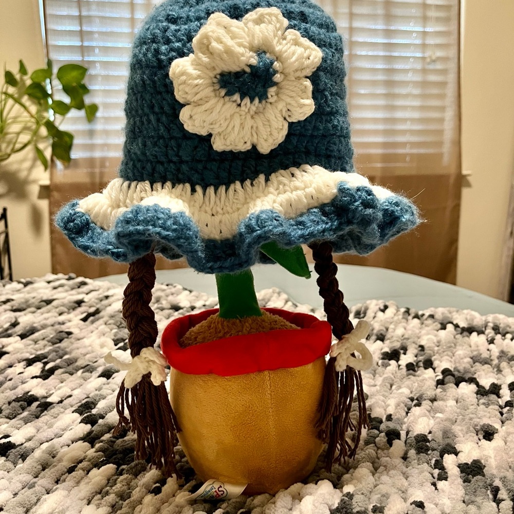 Handcrafted Blue and White Crochet Hat with Flower Accent